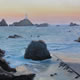 Lighthouse at La Corbiere Jersey - Painting in Surrey Art Gallery